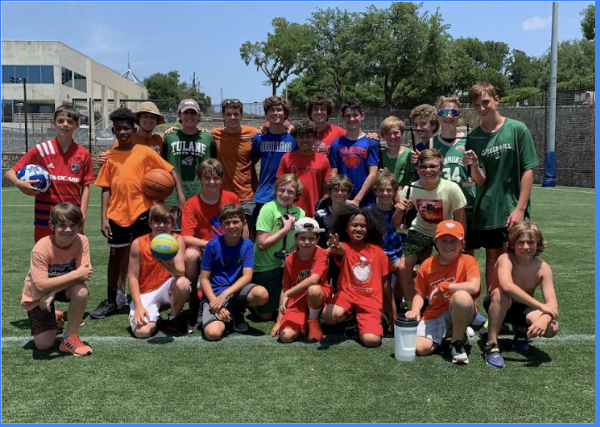 Camp Spark group photo on the field