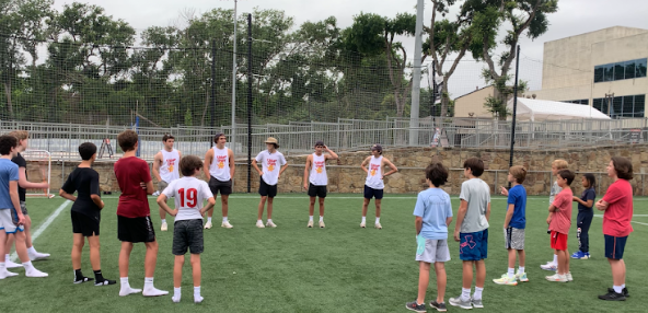 Counselors leading the camp circle